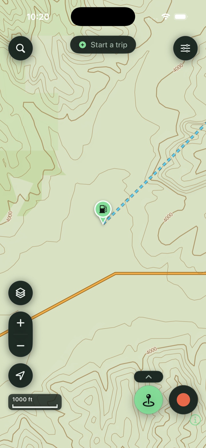 Trailmark's on-device vector topo base with contour lines, forest roads and a planned route
